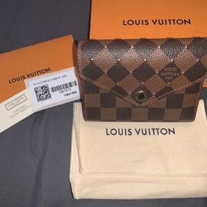 Louis Vuitton Damier Ebene limited edition Victorine Wallet with studs.